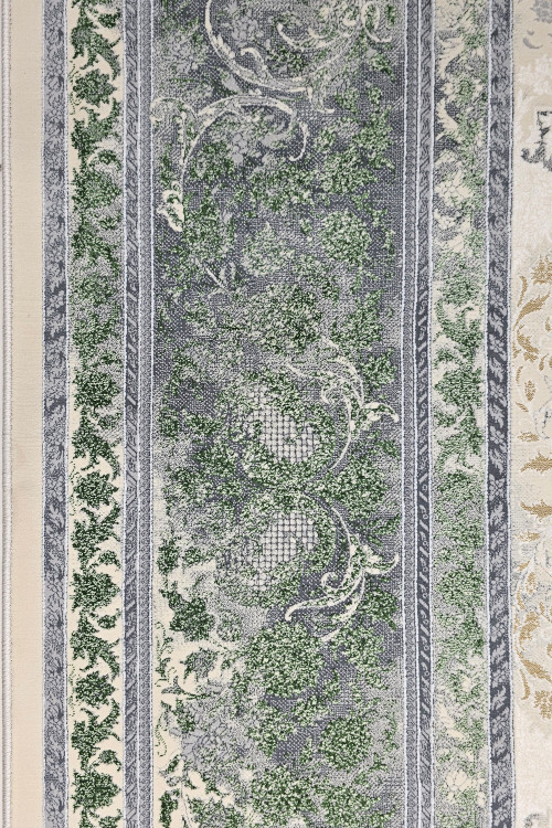 نمای نزدیک از فرش 1200 شانه نقشه وینتیج 1612، بافت نرم و مقاوم.