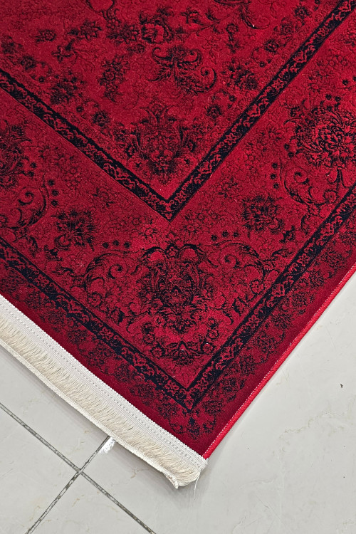 فرش 1200 شانه عظیمزاده با طرح کلاسیک و رنگبندی گرم، مناسب برای هر فضا.