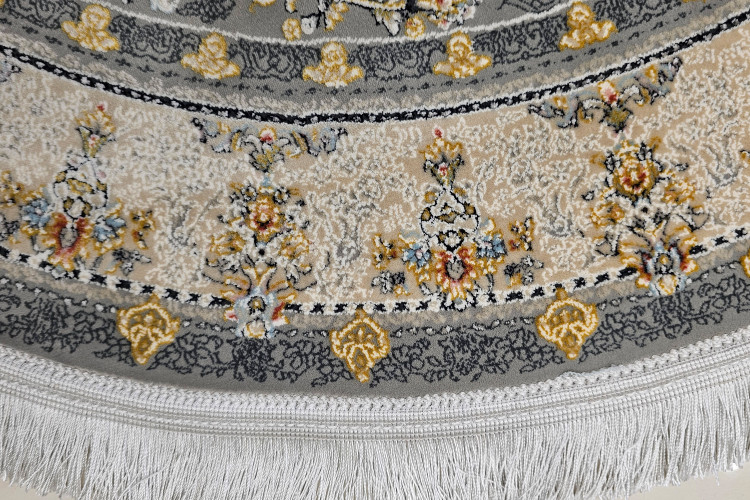 نمای نزدیک از نقوش برجسته فرش دایرهای 1 متری مدل درین فیلی.