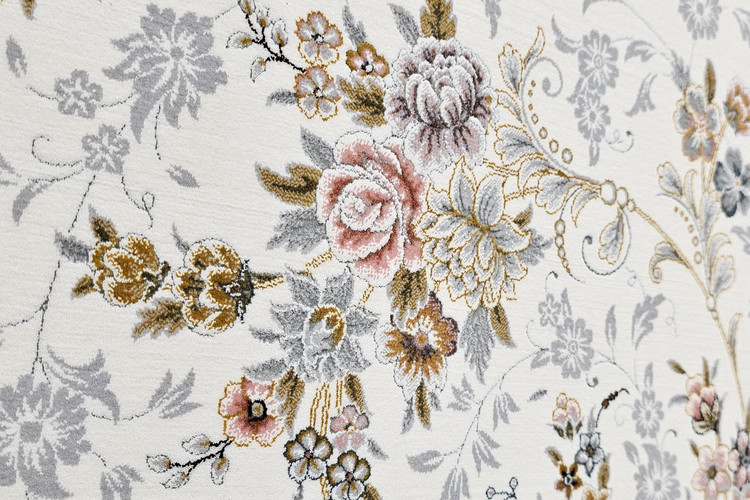 نمای جزئیات بافت فرش ماشینی ماه نشان کاشان با الگوی جورجینا کرم