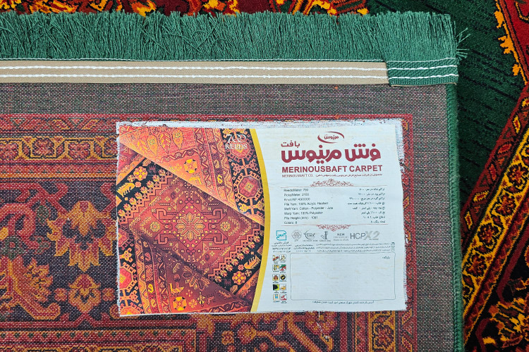 فرش اصیل ایرانی با رنک سبز و نقشه هریس