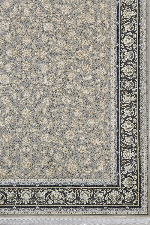 نمای نزدیک از بافت ریز فرش مدرن فیلی رنگ