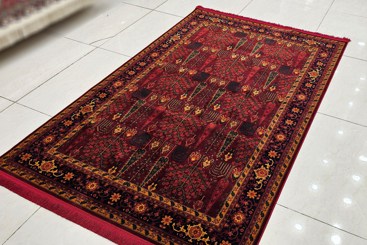فرش ماشینی با نقش عشایری و رنگ گرم